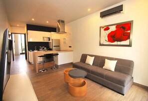 Appartamento Signature, 1 camera da letto | Area soggiorno | Smart TV 40 pollici con canali satellitari, TV