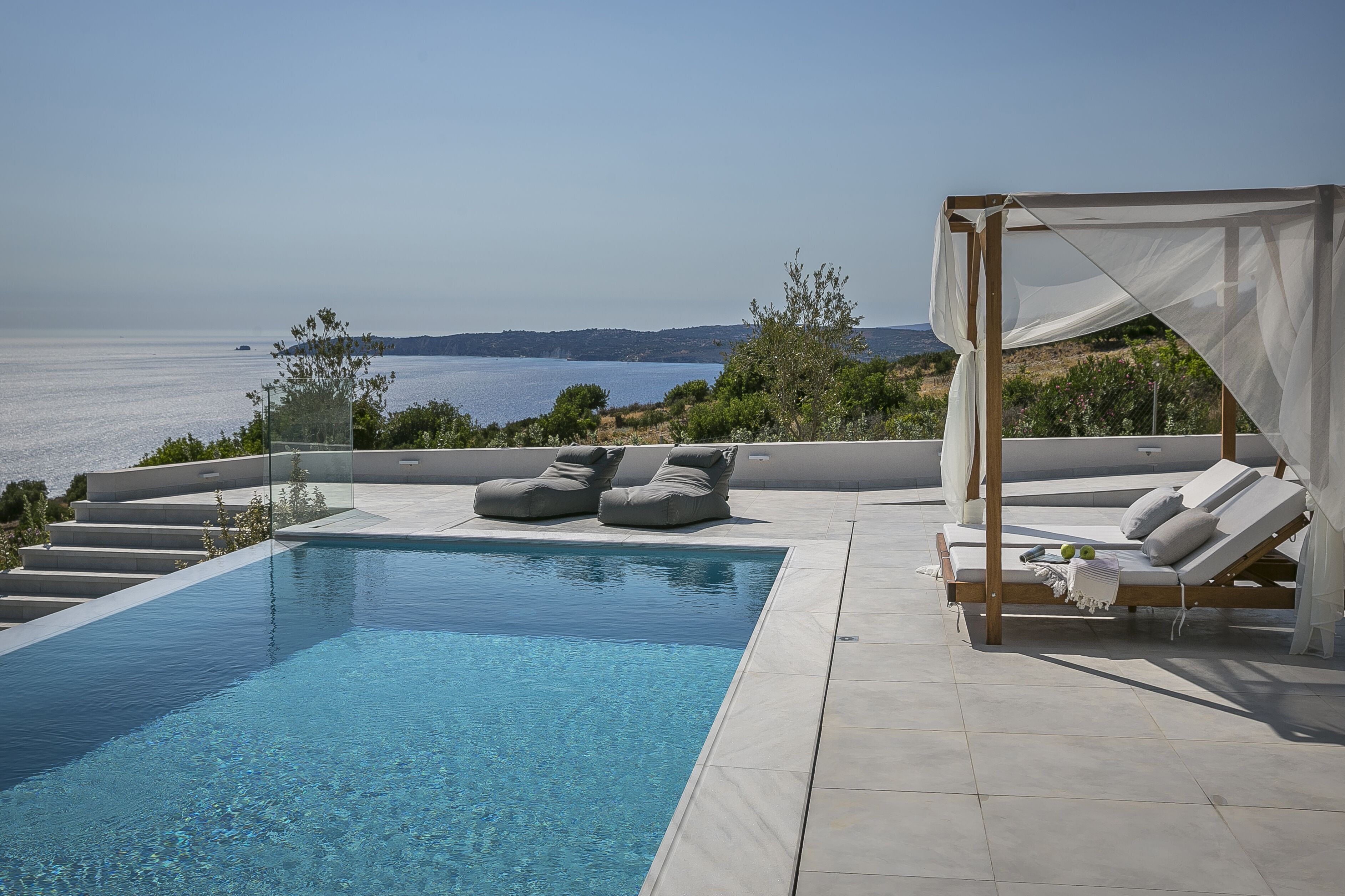 Infinity pool | 2 outdoor pools, a heated pool, pool umbrellas, sun loungers