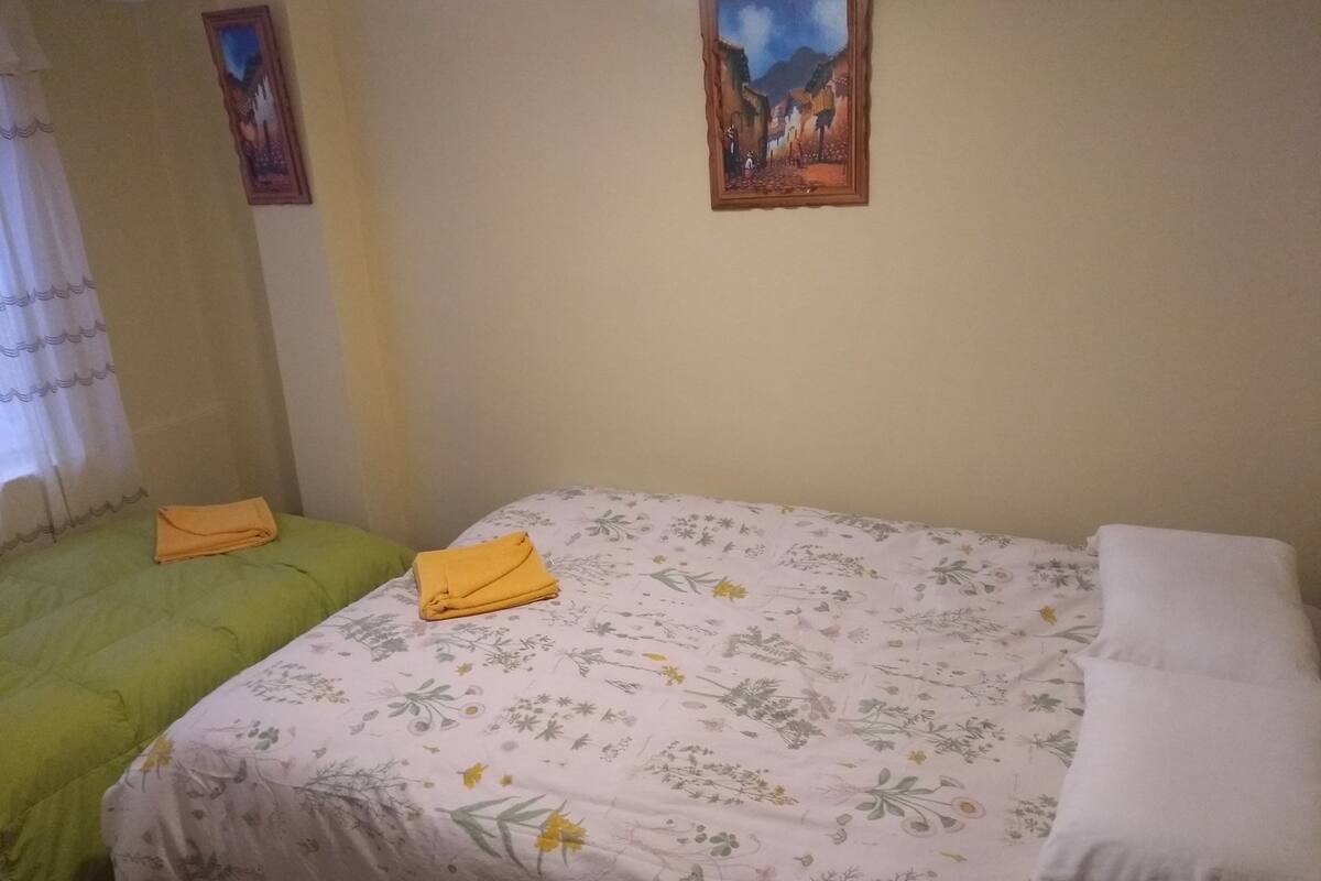 Desk, laptop workspace, free WiFi, bed sheets