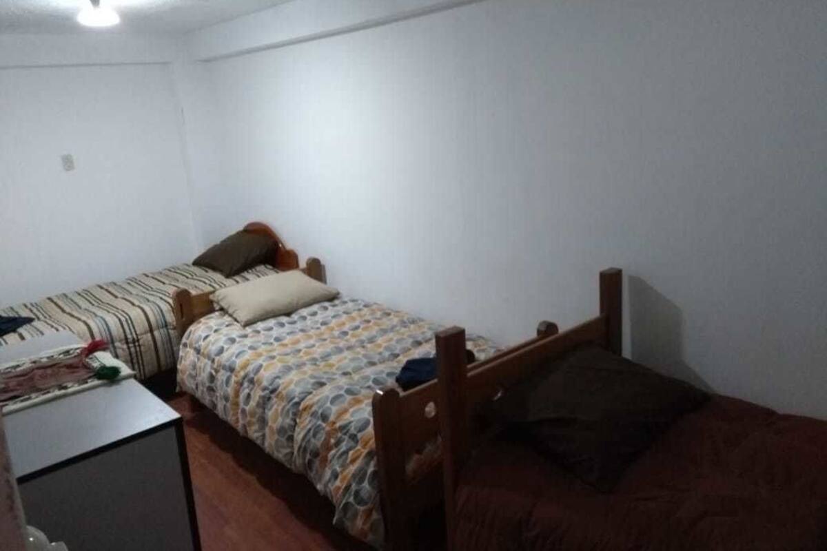 Desk, laptop workspace, free WiFi, bed sheets