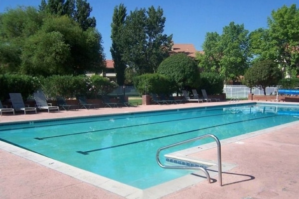 Welcoming large family pool with hot tub and separate toddler pool.