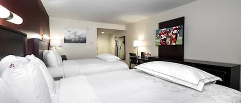 Premium Room, 2 Queen Beds (Upgraded Bedding & Snack, Smoke Free) | Desk, laptop workspace, blackout drapes, free cribs/infant beds