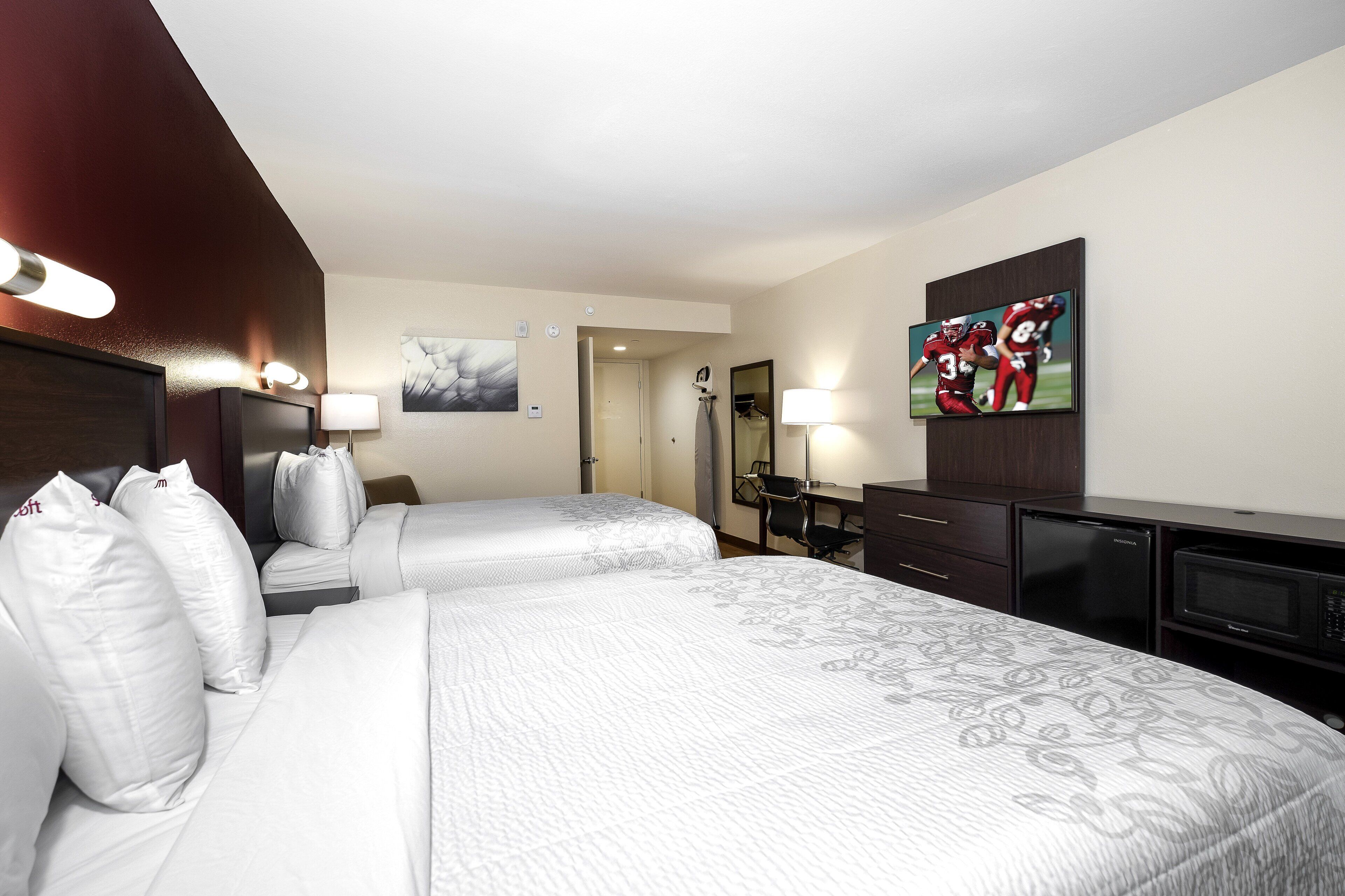 desk, laptop workspace, blackout curtains, free cots/infant beds