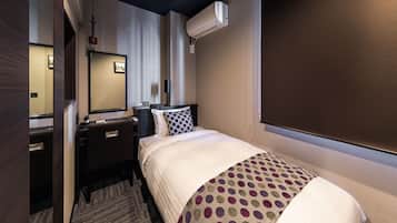 Habitació individual, fumadors (with Shower) | Caixa forta a l'habitació, cortines opaques i planxa i posts de planxar