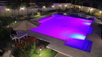Outdoor pool, open 7:00 AM to 10:00 PM, pool umbrellas, pool loungers