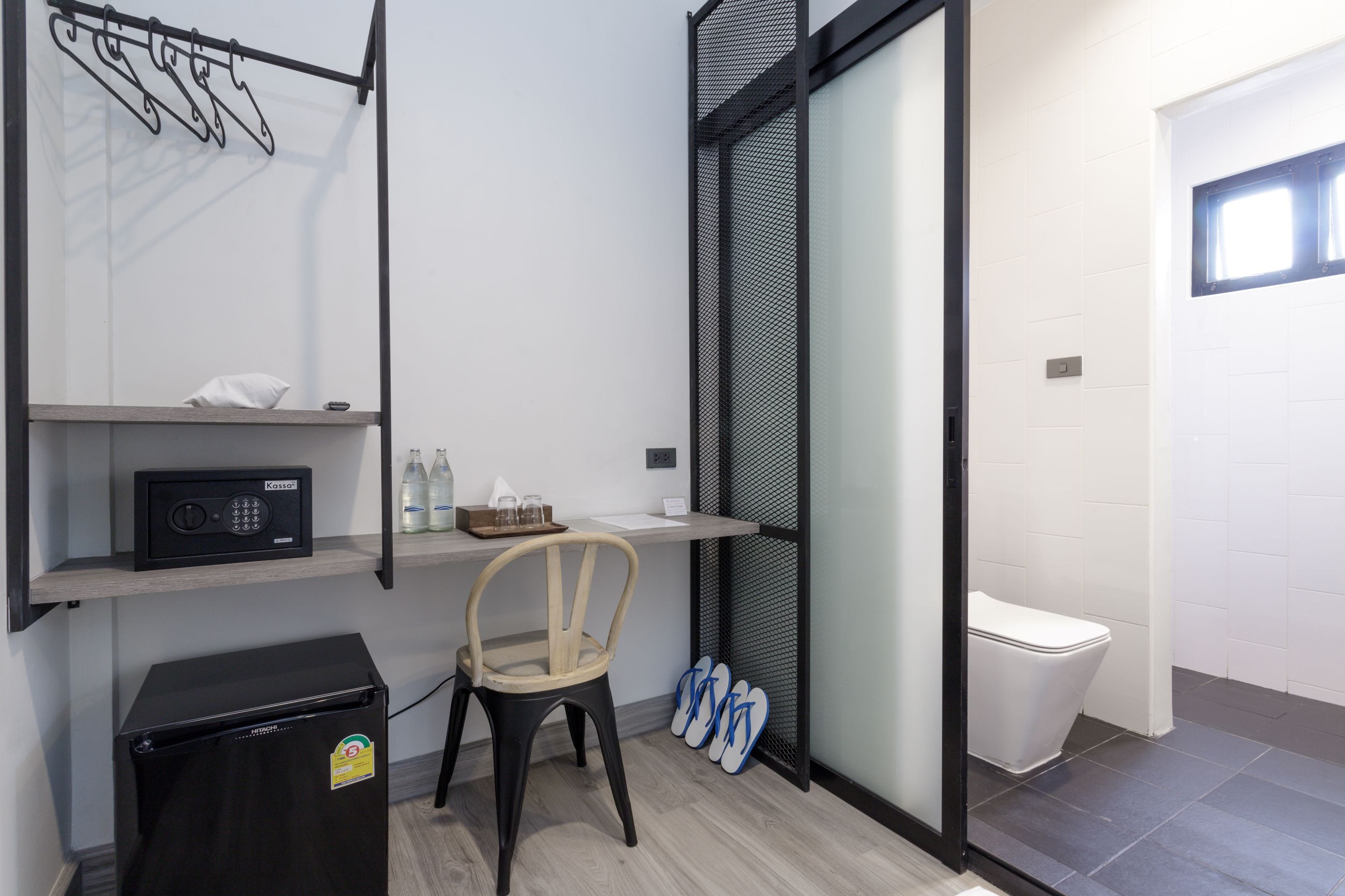 deluxe king room | bathroom | eco-friendly toiletries, hair dryer, slippers, towels