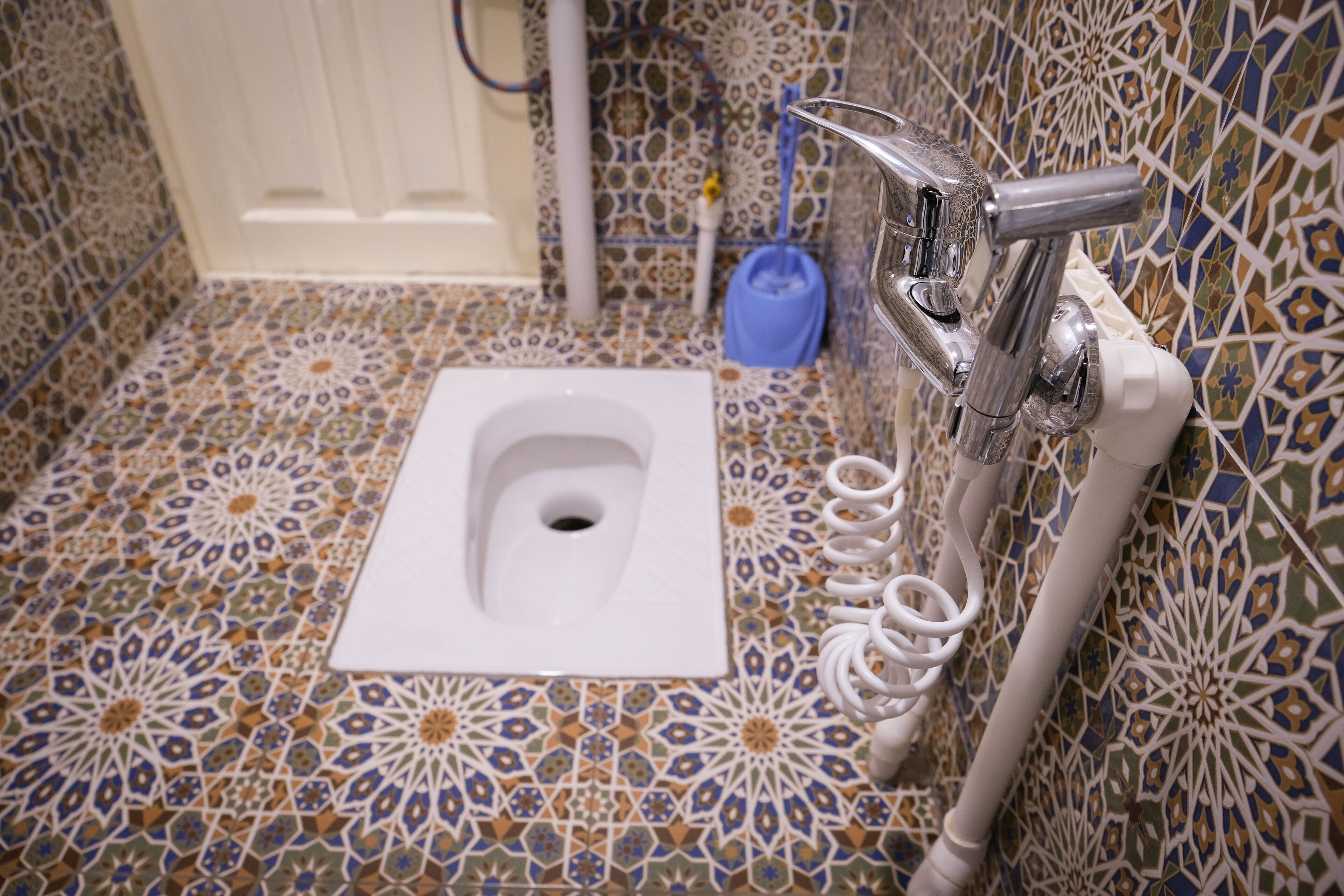 Shower, free toiletries, hair dryer, slippers