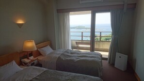 Twin Room, Private Bathroom, Ocean View | Free WiFi