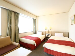 Escritorio, sistema de insonorización, wifi gratis y ropa de cama 