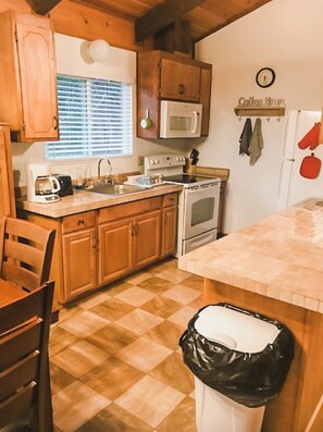 Fridge, microwave, coffee/tea maker, toaster