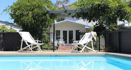 A French style boutique guesthouse set in a large garden with a spa and pool.