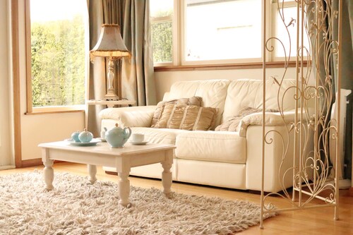 A French style boutique guesthouse set in a large garden with a spa and pool.