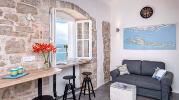 Deluxe Studio, Sea View (Levanda) | Living area | Flat-screen TV