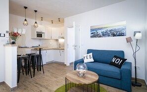 Deluxe Apartment, Balcony, Sea View (Kadulja) | Living area | Flat-screen TV - Villa Riva (Jelsa)