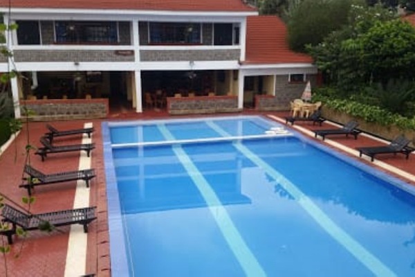 Outdoor pool, pool umbrellas, sun loungers