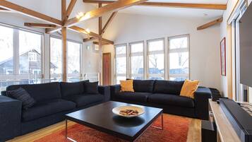 Casi 67 East | Living room | 65-inch LED TV with satellite channels, TV, DVD player