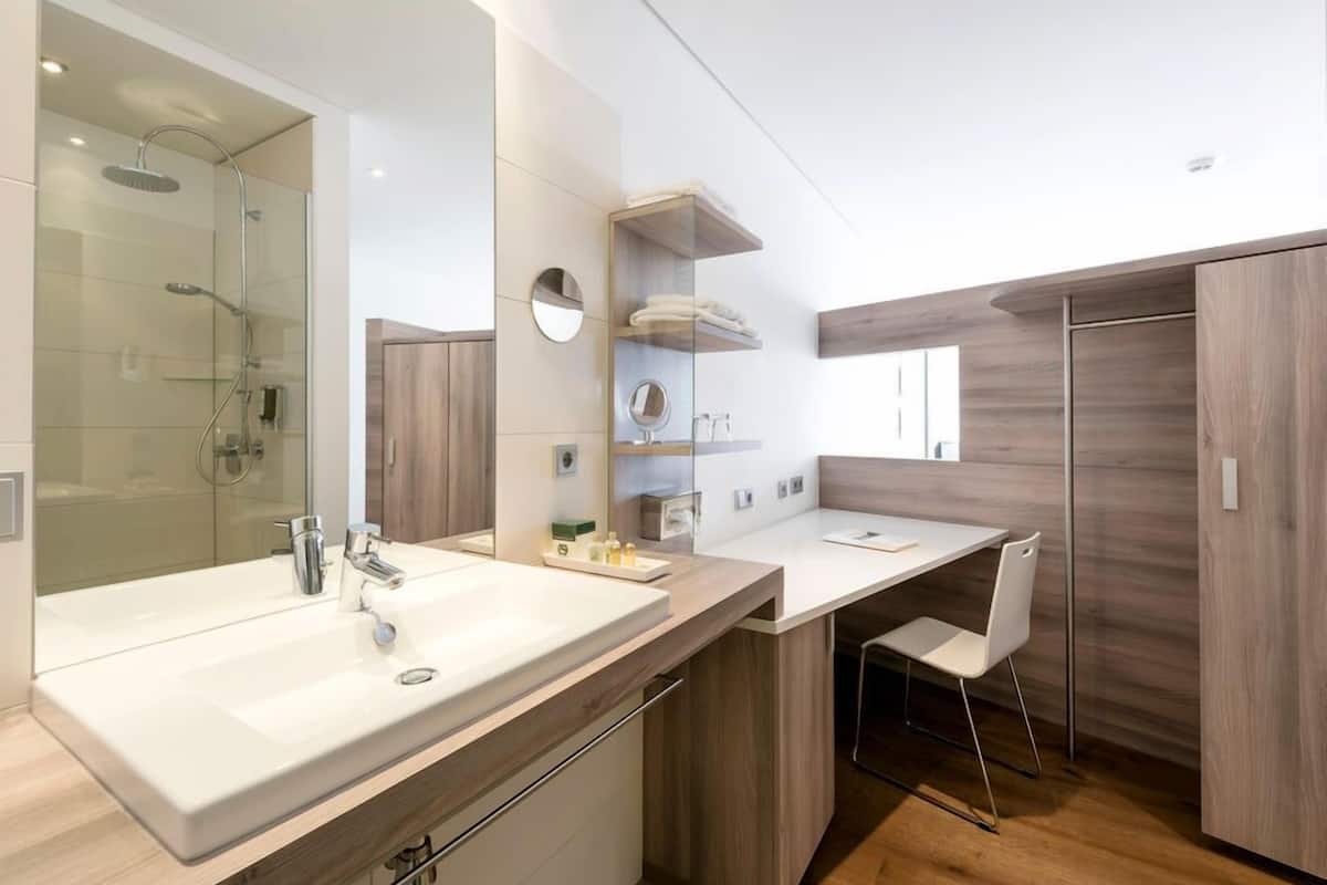 shower, bathrobes, slippers, towels