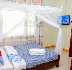 Blackout drapes, free WiFi, bed sheets