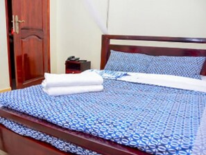 Blackout drapes, free WiFi, bed sheets