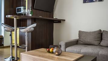 Apartment, 2 Bedrooms (D9) | Living area | Flat-screen TV