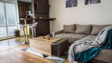 Apartment, 2 Bedrooms (D9) | Living area | Flat-screen TV