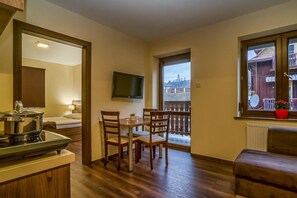 Suite Studio Majestueuse | Coin séjour