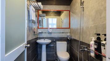City Quadruple Room | Bathroom | Shower, free toiletries, hair dryer, bathrobes