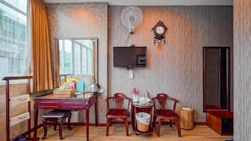 Family Triple Room | Minibar, in-room safe, blackout drapes, iron/ironing board