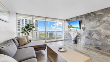 Apartment, 4 Bedrooms | Living area | 55-inch TV with digital channels, Netflix, streaming services