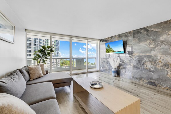 Apartment, 4 Bedrooms | Living area | 55-inch TV with digital channels, Netflix, streaming services