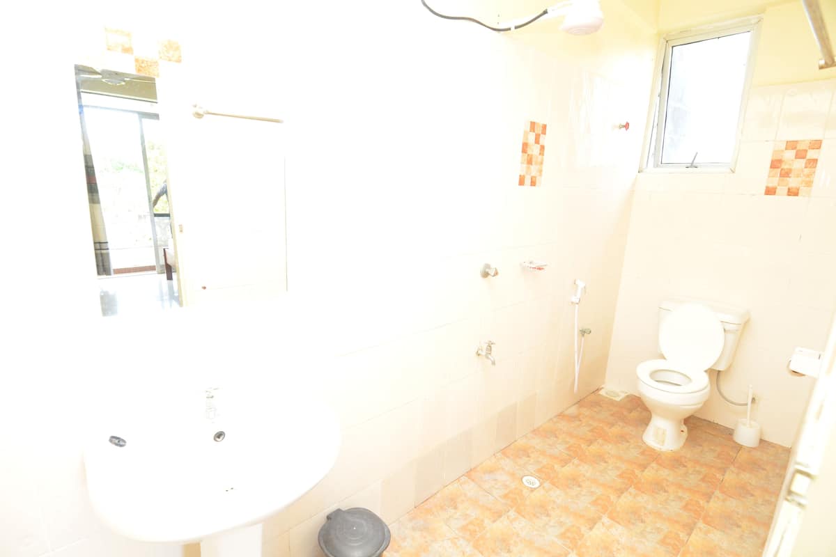 Double or Twin Room | Bathroom | Shower, rainfall showerhead, slippers, towels