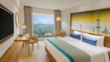 Premium Room, 1 King Bed | Minibar, in-room safe, individually decorated, individually furnished