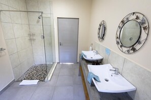 Separate tub and shower, rainfall showerhead, free toiletries