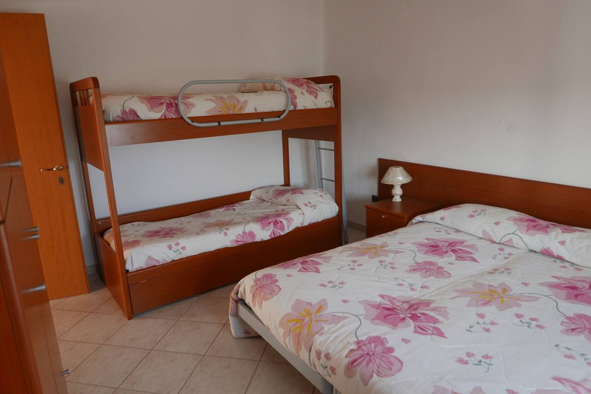 Family Room, Multiple Beds, Private Bathroom, Tower | Premium bedding, free WiFi, individually decorated