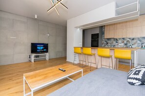 Exclusive-Apartment | Wohnbereich | Flachbildfernseher