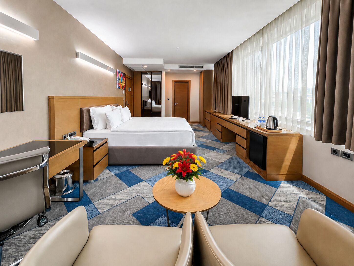Habitación ejecutiva, 1 cama King size | Minibar, caja de seguridad en la habitación y escritorio 