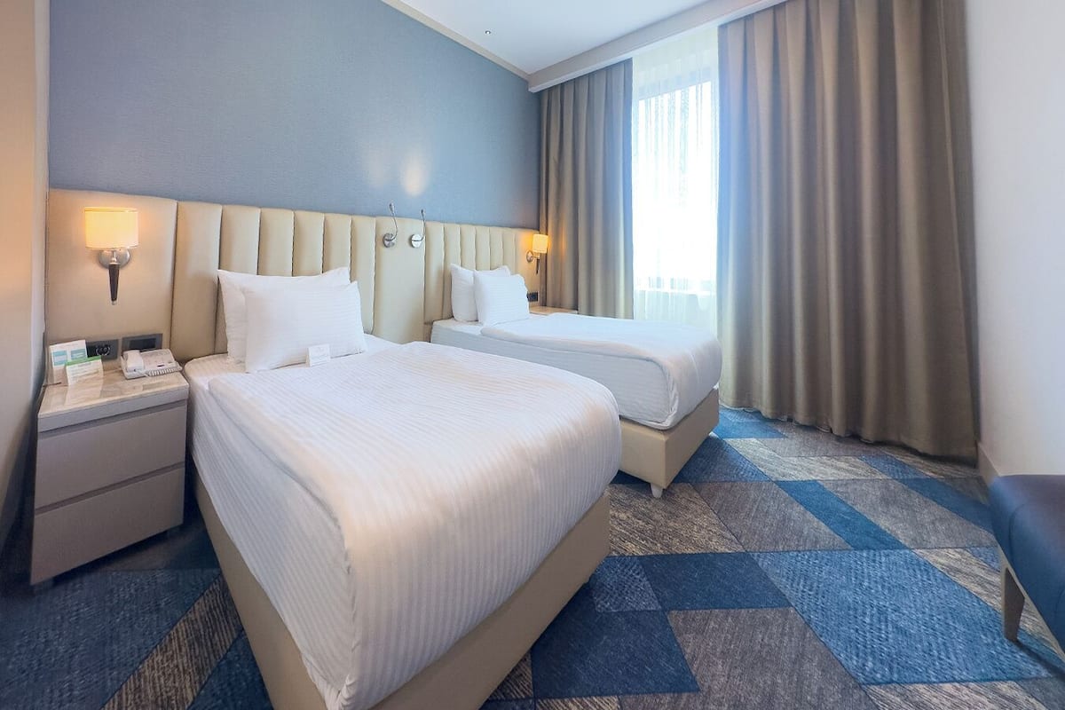 Superior Room, 2 Twin Beds | Minibar, in-room safe, individually decorated, individually furnished