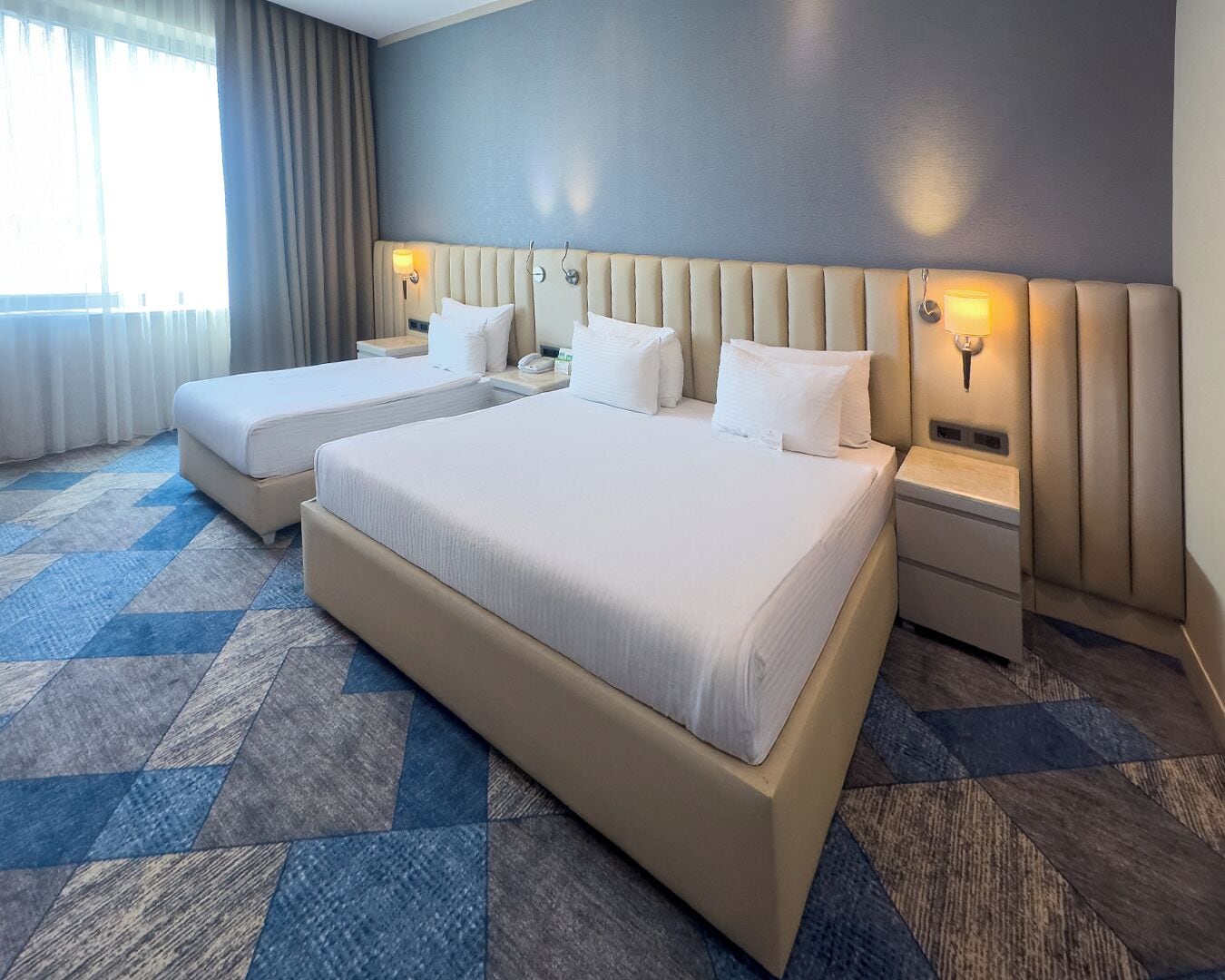 Superior Room, Multiple Beds | Minibar, in-room safe, individually decorated, individually furnished