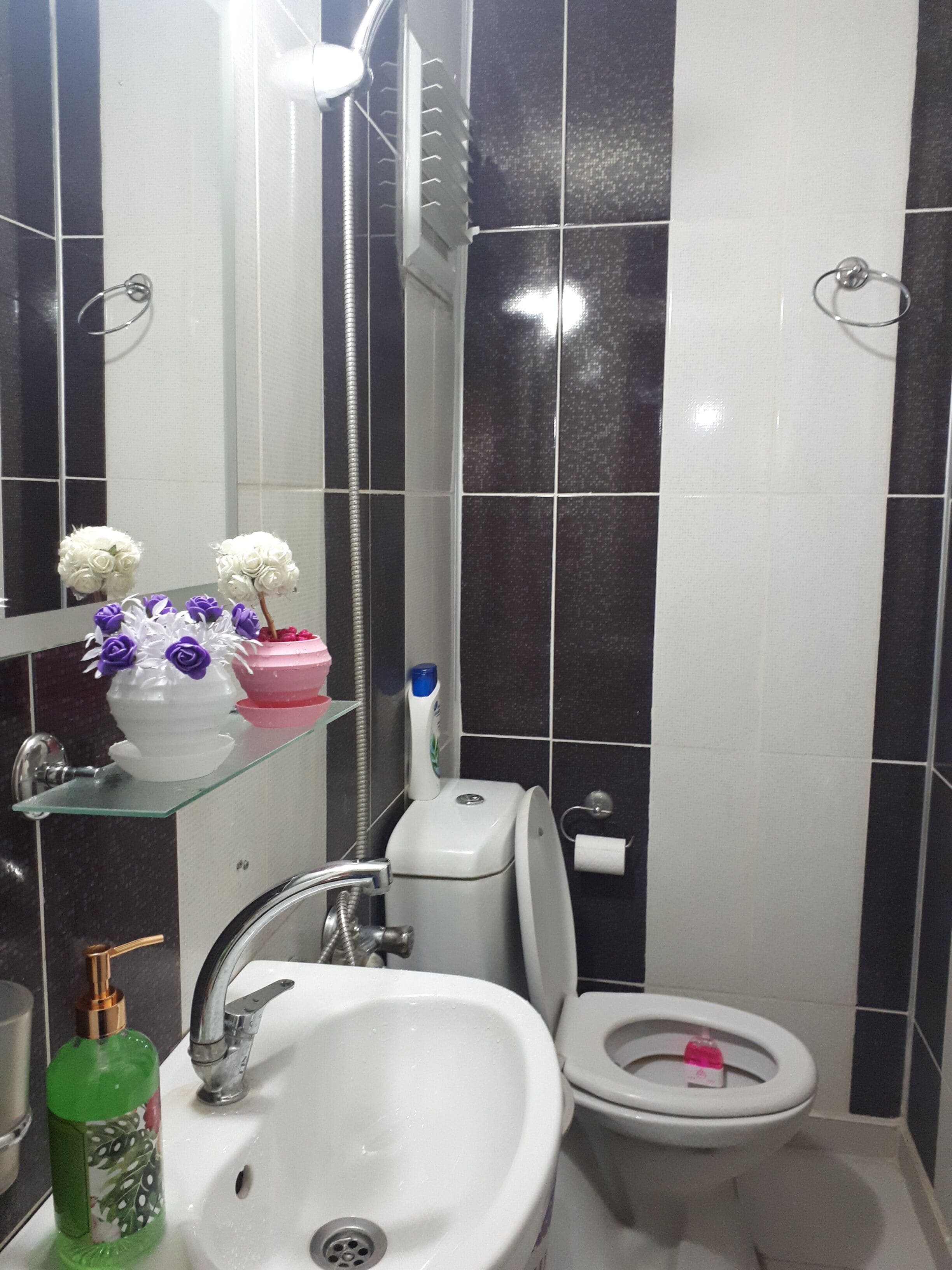 classic quadruple room | bathroom | shower, hair dryer, slippers, towels