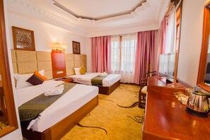 Deluxe Family Room | Premium bedding, minibar, individually decorated, desk - Angkor Year Theme Hotel (Siem Reap)