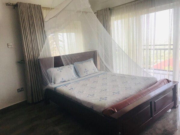 Desk, laptop workspace, free WiFi, bed sheets