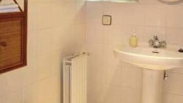 Bathtub, hair dryer, bidet