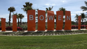 A sign with the word "BOWEN" in large letters. - Golden Sands Beach House, Rose Bay,  Bowen (Bowen)