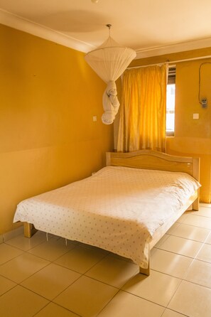 Deluxe Room, 1 Double Bed | Desk, laptop workspace, bed sheets