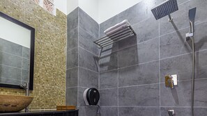 Shower, hair dryer, slippers, towels