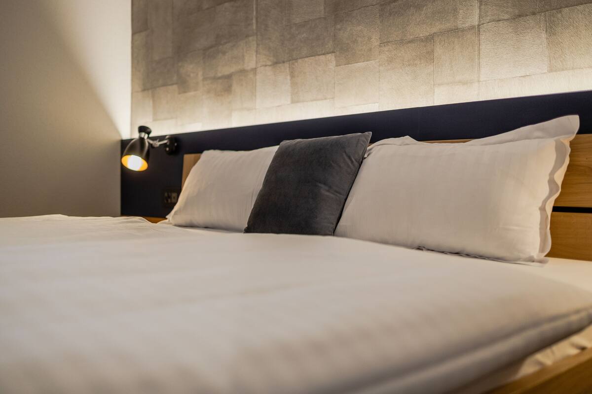 individually decorated, individually furnished, desk, blackout curtains