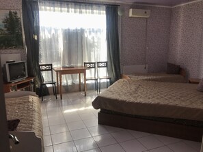 Quarto quádruplo família | Ferros/tábuas de passar roupa, Wi-Fi de cortesia, roupa de cama