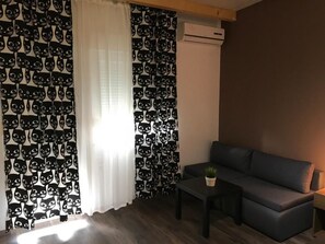 Classic-Doppelzimmer | Wohnbereich | Flachbildfernseher