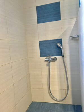 Hair dryer, towels, soap, shampoo