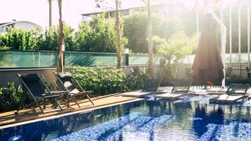 Outdoor pool, pool umbrellas, pool loungers